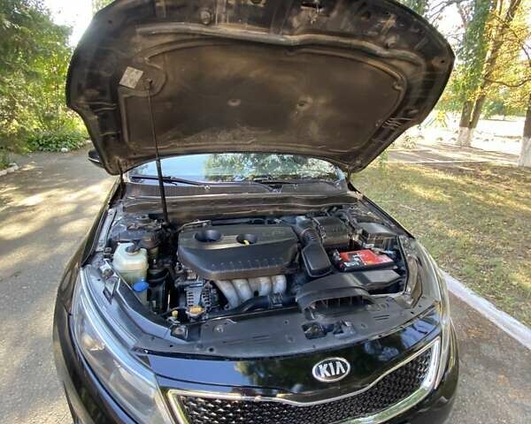 Чорний Кіа K5, об'ємом двигуна 2 л та пробігом 209 тис. км за 8200 $, фото 11 на Automoto.ua