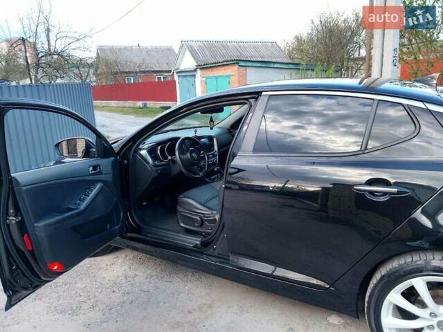 Черный Киа K5, объемом двигателя 2 л и пробегом 200 тыс. км за 9200 $, фото 16 на Automoto.ua