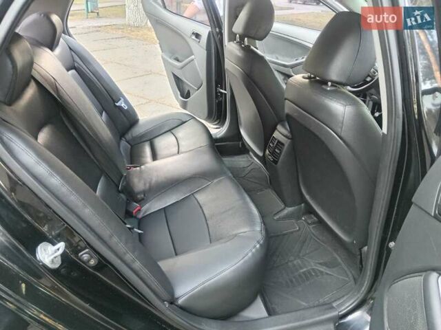 Черный Киа K5, объемом двигателя 2 л и пробегом 287 тыс. км за 7700 $, фото 3 на Automoto.ua