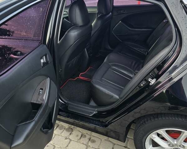 Черный Киа K5, объемом двигателя 2 л и пробегом 408 тыс. км за 6400 $, фото 11 на Automoto.ua