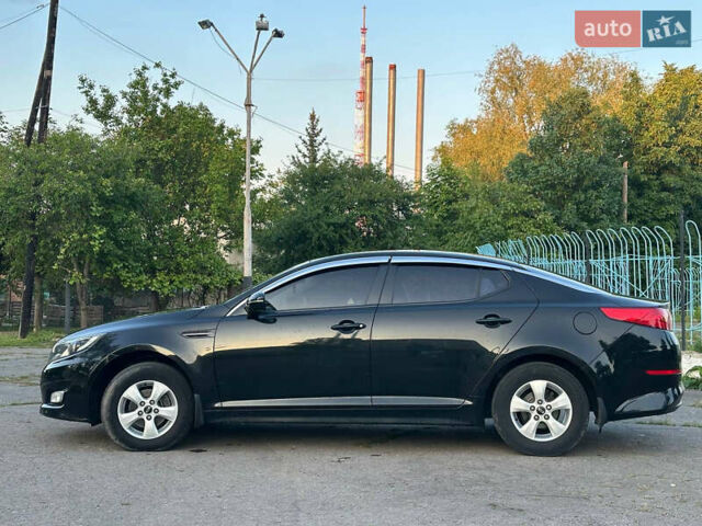Черный Киа K5, объемом двигателя 2 л и пробегом 136 тыс. км за 8600 $, фото 3 на Automoto.ua