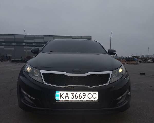 Черный Киа K5, объемом двигателя 2 л и пробегом 281 тыс. км за 11200 $, фото 7 на Automoto.ua