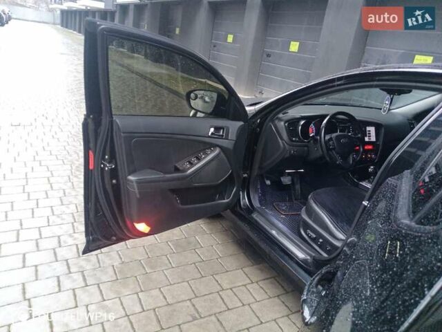 Черный Киа K5, объемом двигателя 2 л и пробегом 255 тыс. км за 9750 $, фото 12 на Automoto.ua