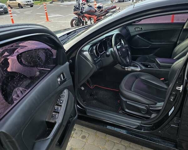 Черный Киа K5, объемом двигателя 2 л и пробегом 408 тыс. км за 6400 $, фото 10 на Automoto.ua