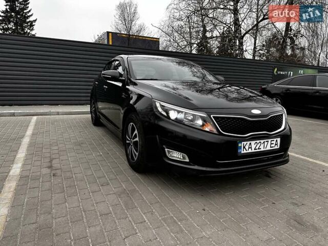 Черный Киа K5, объемом двигателя 2 л и пробегом 321 тыс. км за 8100 $, фото 1 на Automoto.ua