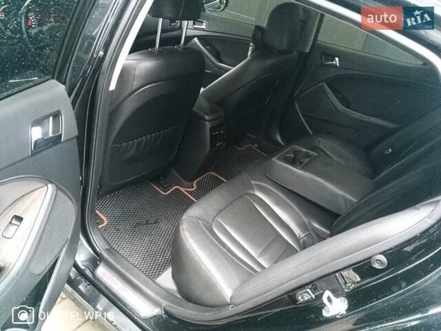Черный Киа K5, объемом двигателя 2 л и пробегом 255 тыс. км за 9750 $, фото 14 на Automoto.ua