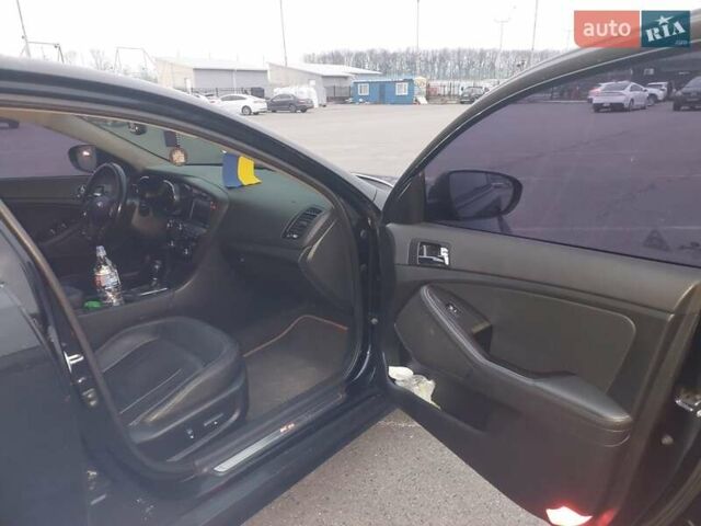 Черный Киа K5, объемом двигателя 2 л и пробегом 281 тыс. км за 11200 $, фото 15 на Automoto.ua