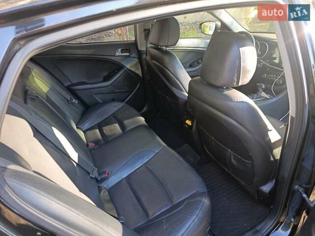 Черный Киа K5, объемом двигателя 2 л и пробегом 131 тыс. км за 12000 $, фото 13 на Automoto.ua