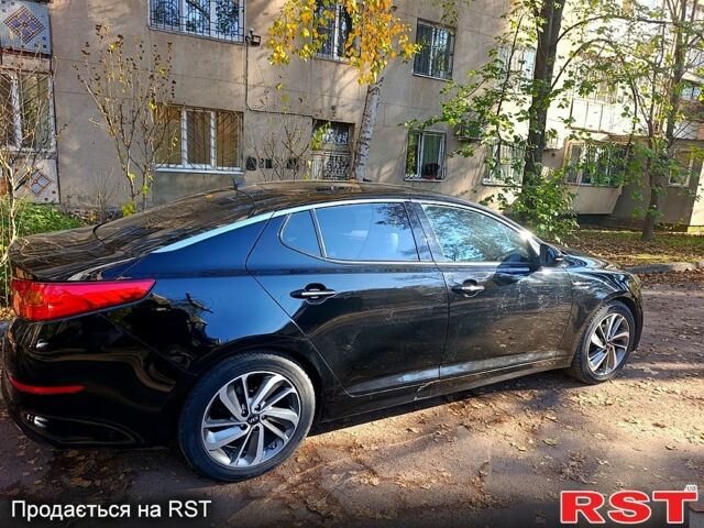 Черный Киа K5, объемом двигателя 2 л и пробегом 131 тыс. км за 12000 $, фото 4 на Automoto.ua