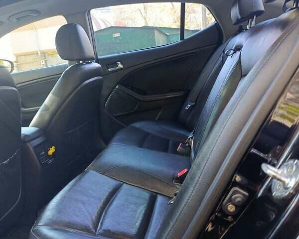 Черный Киа K5, объемом двигателя 2 л и пробегом 131 тыс. км за 12000 $, фото 16 на Automoto.ua