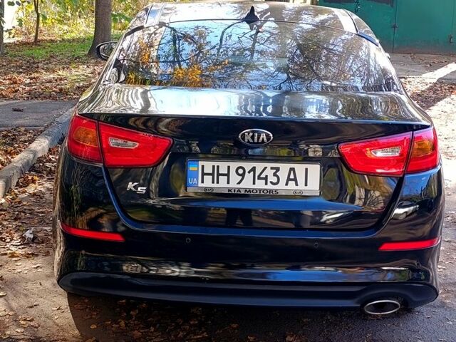 Черный Киа K5, объемом двигателя 2 л и пробегом 131 тыс. км за 12000 $, фото 2 на Automoto.ua