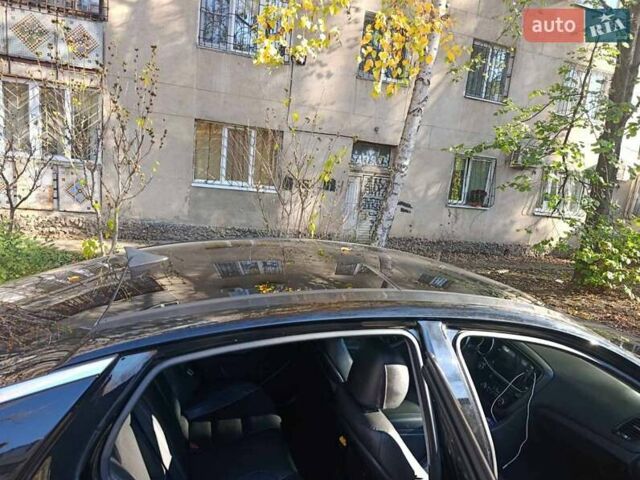 Черный Киа K5, объемом двигателя 2 л и пробегом 131 тыс. км за 12000 $, фото 14 на Automoto.ua