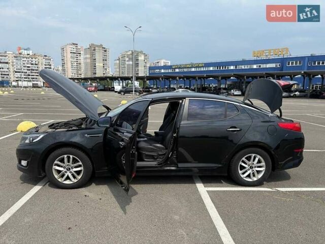 Черный Киа K5, объемом двигателя 2 л и пробегом 220 тыс. км за 10500 $, фото 8 на Automoto.ua