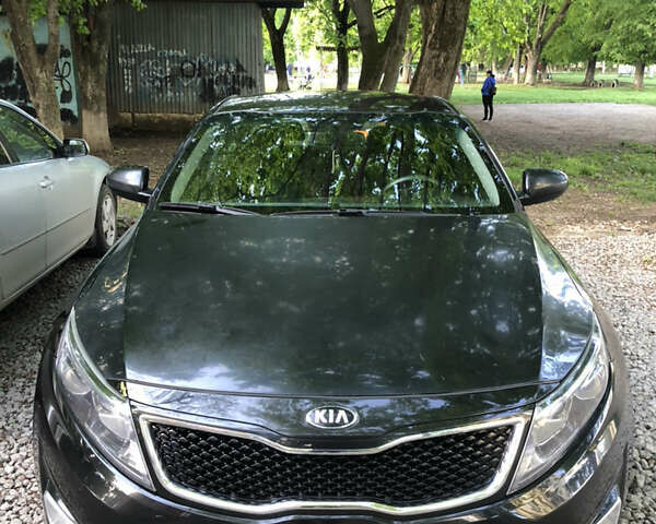 Черный Киа K5, объемом двигателя 2 л и пробегом 276 тыс. км за 9000 $, фото 6 на Automoto.ua