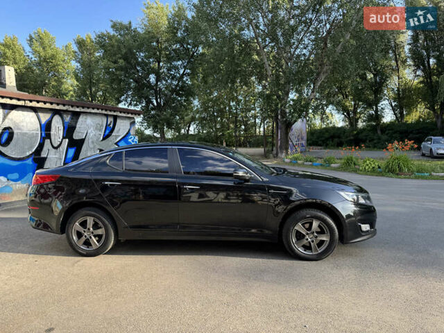 Черный Киа K5, объемом двигателя 2 л и пробегом 202 тыс. км за 9900 $, фото 2 на Automoto.ua