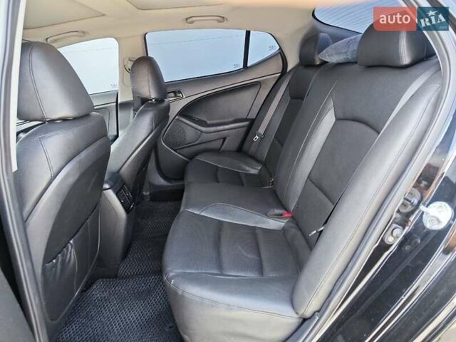 Черный Киа K5, объемом двигателя 2 л и пробегом 209 тыс. км за 11990 $, фото 9 на Automoto.ua