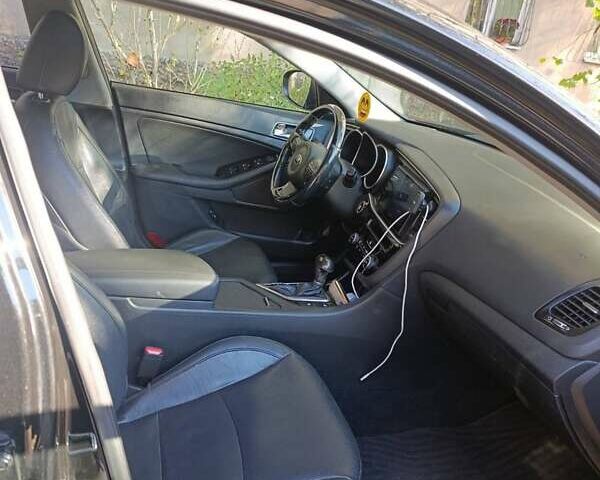 Черный Киа K5, объемом двигателя 2 л и пробегом 131 тыс. км за 12000 $, фото 17 на Automoto.ua