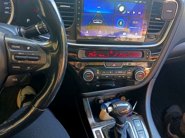 Черный Киа K5, объемом двигателя 2 л и пробегом 131 тыс. км за 12000 $, фото 1 на Automoto.ua