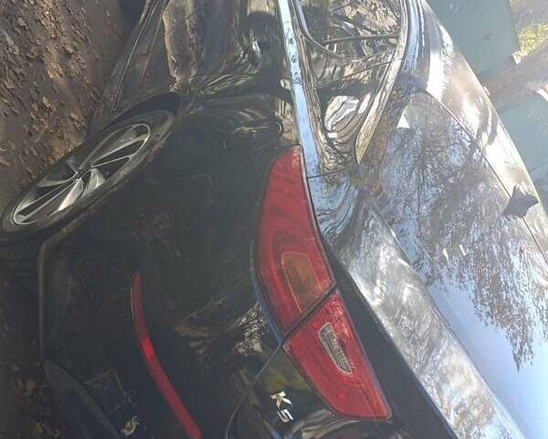 Черный Киа K5, объемом двигателя 2 л и пробегом 131 тыс. км за 12000 $, фото 5 на Automoto.ua