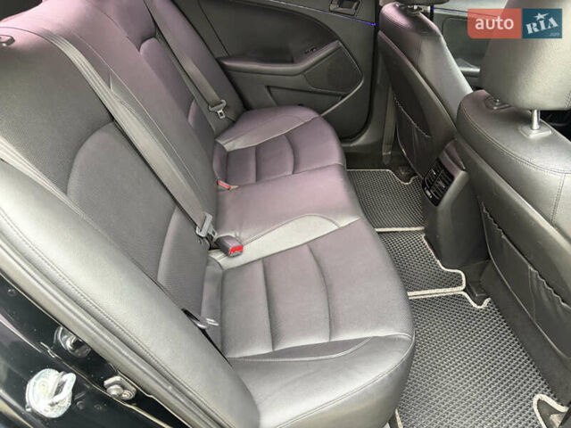 Чорний Кіа K5, об'ємом двигуна 2 л та пробігом 247 тис. км за 10800 $, фото 12 на Automoto.ua