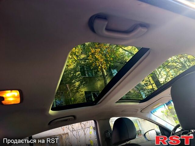 Черный Киа K5, объемом двигателя 2 л и пробегом 131 тыс. км за 12000 $, фото 6 на Automoto.ua