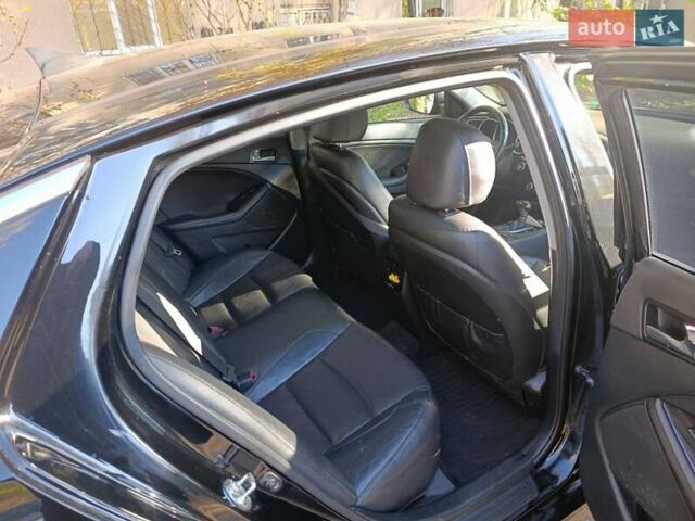 Черный Киа K5, объемом двигателя 2 л и пробегом 131 тыс. км за 12000 $, фото 12 на Automoto.ua