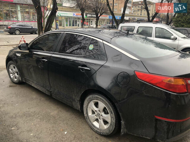 Черный Киа K5, объемом двигателя 2 л и пробегом 276 тыс. км за 9000 $, фото 3 на Automoto.ua