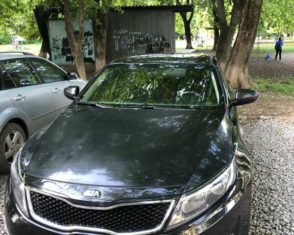 Черный Киа K5, объемом двигателя 2 л и пробегом 276 тыс. км за 9000 $, фото 7 на Automoto.ua