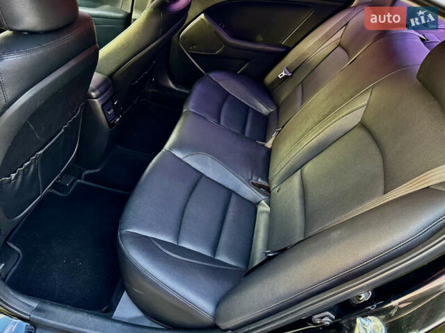 Черный Киа K5, объемом двигателя 2 л и пробегом 160 тыс. км за 8100 $, фото 13 на Automoto.ua