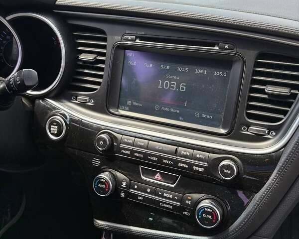 Черный Киа K5, объемом двигателя 2 л и пробегом 220 тыс. км за 10500 $, фото 24 на Automoto.ua