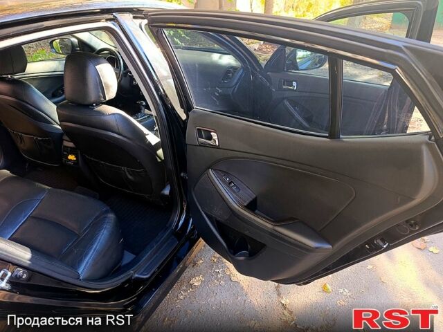 Черный Киа K5, объемом двигателя 2 л и пробегом 131 тыс. км за 12000 $, фото 7 на Automoto.ua