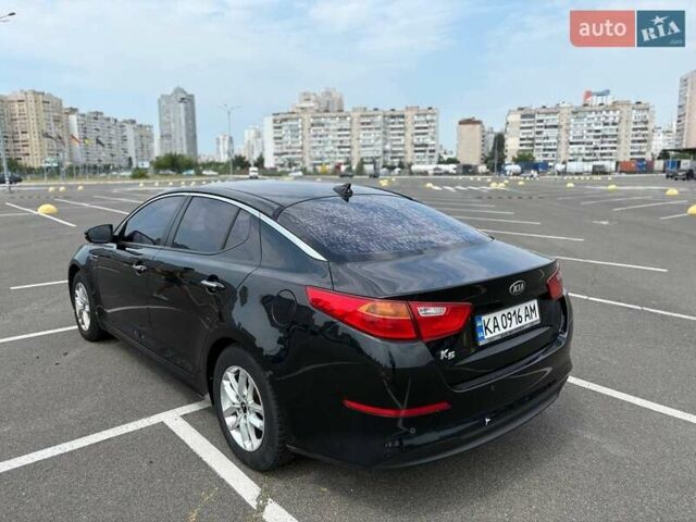 Черный Киа K5, объемом двигателя 2 л и пробегом 220 тыс. км за 10500 $, фото 5 на Automoto.ua