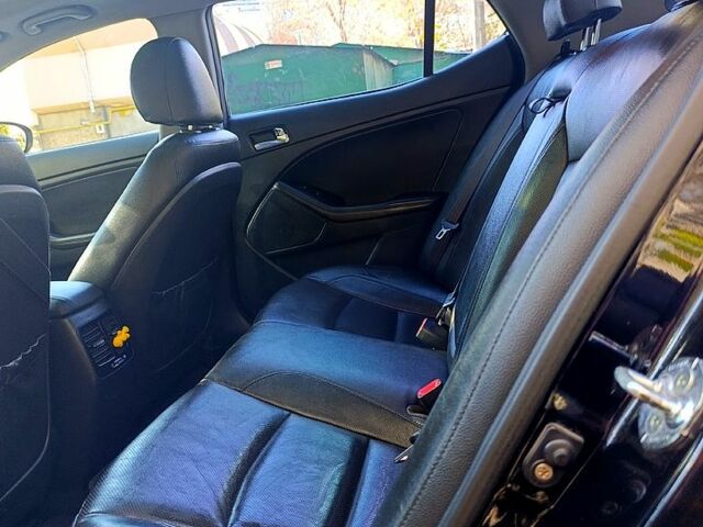 Черный Киа K5, объемом двигателя 2 л и пробегом 131 тыс. км за 12000 $, фото 3 на Automoto.ua