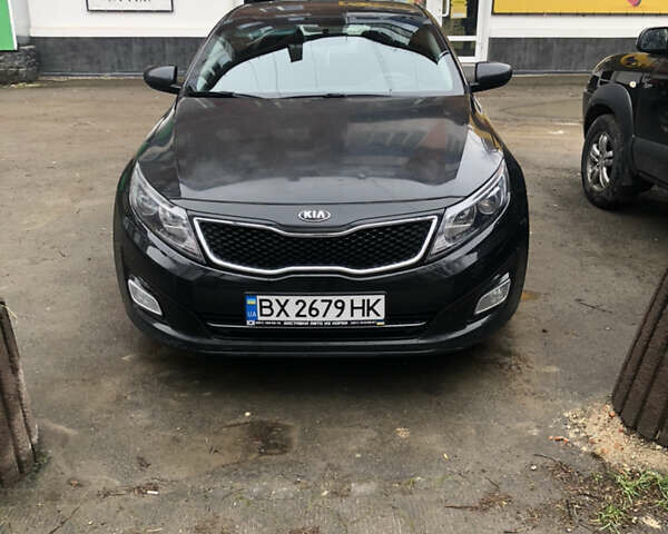 Черный Киа K5, объемом двигателя 2 л и пробегом 276 тыс. км за 9000 $, фото 5 на Automoto.ua