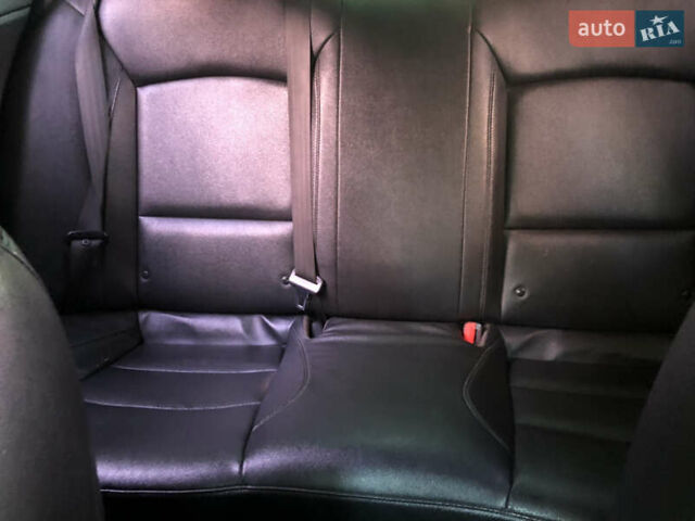 Черный Киа K5, объемом двигателя 2 л и пробегом 276 тыс. км за 9000 $, фото 12 на Automoto.ua