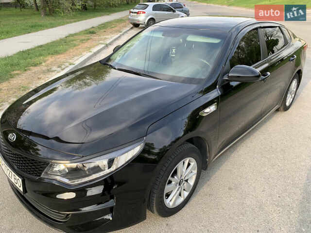 Черный Киа K5, объемом двигателя 2 л и пробегом 263 тыс. км за 11600 $, фото 3 на Automoto.ua