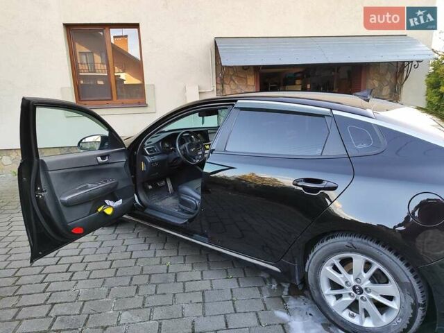 Чорний Кіа K5, об'ємом двигуна 2 л та пробігом 176 тис. км за 10600 $, фото 1 на Automoto.ua