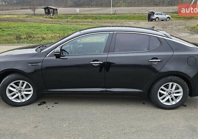 Чорний Кіа K5, об'ємом двигуна 2 л та пробігом 125 тис. км за 12000 $, фото 2 на Automoto.ua