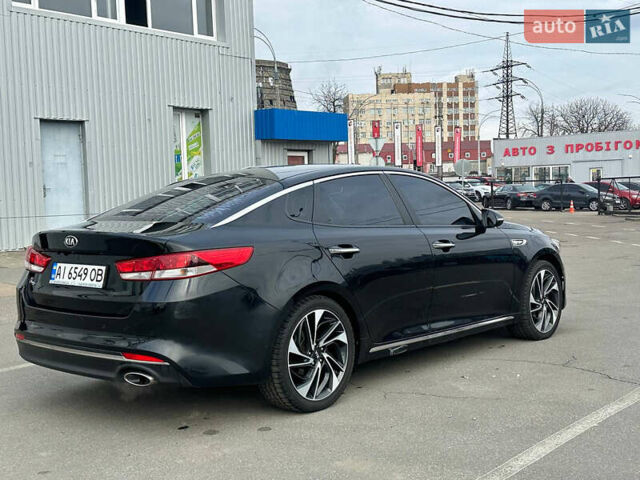 Черный Киа K5, объемом двигателя 2 л и пробегом 90 тыс. км за 10500 $, фото 5 на Automoto.ua