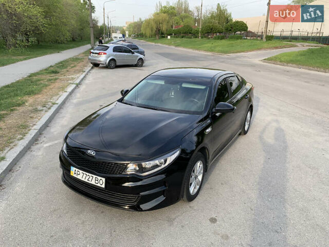 Черный Киа K5, объемом двигателя 2 л и пробегом 263 тыс. км за 11600 $, фото 2 на Automoto.ua