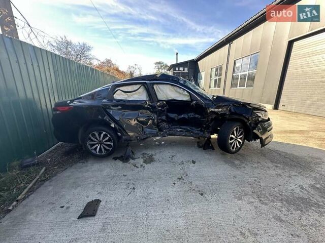 Черный Киа K5, объемом двигателя 2 л и пробегом 140 тыс. км за 5000 $, фото 1 на Automoto.ua