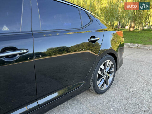 Черный Киа K5, объемом двигателя 2 л и пробегом 102 тыс. км за 12650 $, фото 24 на Automoto.ua