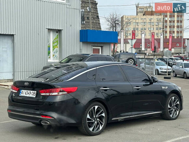 Черный Киа K5, объемом двигателя 2 л и пробегом 90 тыс. км за 10500 $, фото 10 на Automoto.ua
