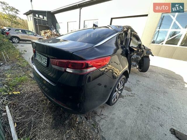 Черный Киа K5, объемом двигателя 2 л и пробегом 140 тыс. км за 5000 $, фото 6 на Automoto.ua