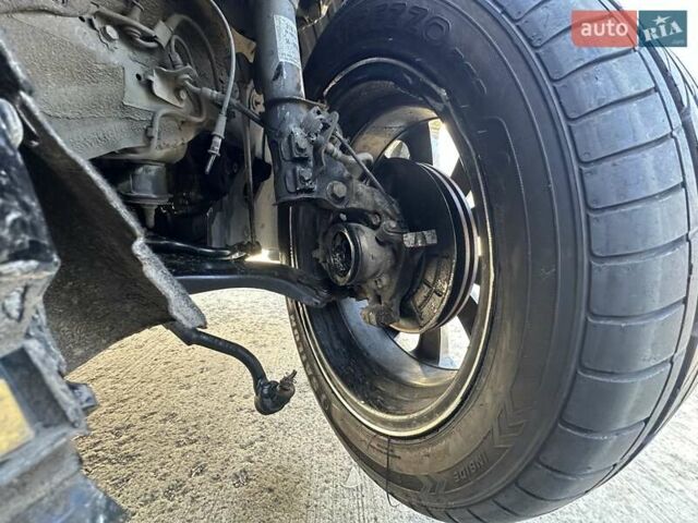 Черный Киа K5, объемом двигателя 2 л и пробегом 140 тыс. км за 5000 $, фото 37 на Automoto.ua