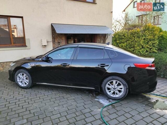 Чорний Кіа K5, об'ємом двигуна 2 л та пробігом 176 тис. км за 10600 $, фото 2 на Automoto.ua