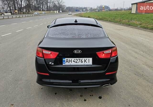 Чорний Кіа K5, об'ємом двигуна 2 л та пробігом 125 тис. км за 12000 $, фото 8 на Automoto.ua