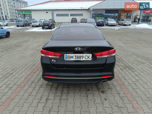 Черный Киа K5, объемом двигателя 2 л и пробегом 209 тыс. км за 11300 $, фото 2 на Automoto.ua