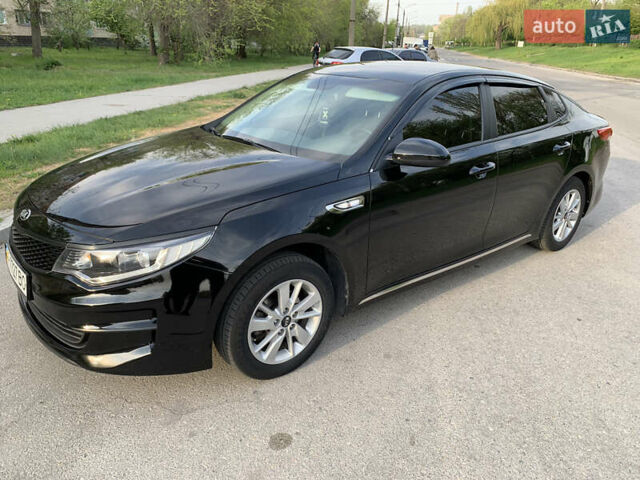 Черный Киа K5, объемом двигателя 2 л и пробегом 263 тыс. км за 11600 $, фото 4 на Automoto.ua