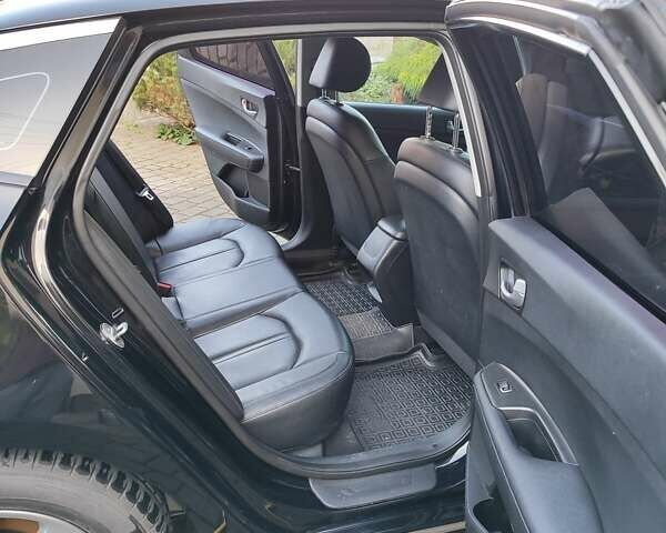 Чорний Кіа K5, об'ємом двигуна 2 л та пробігом 176 тис. км за 10600 $, фото 8 на Automoto.ua